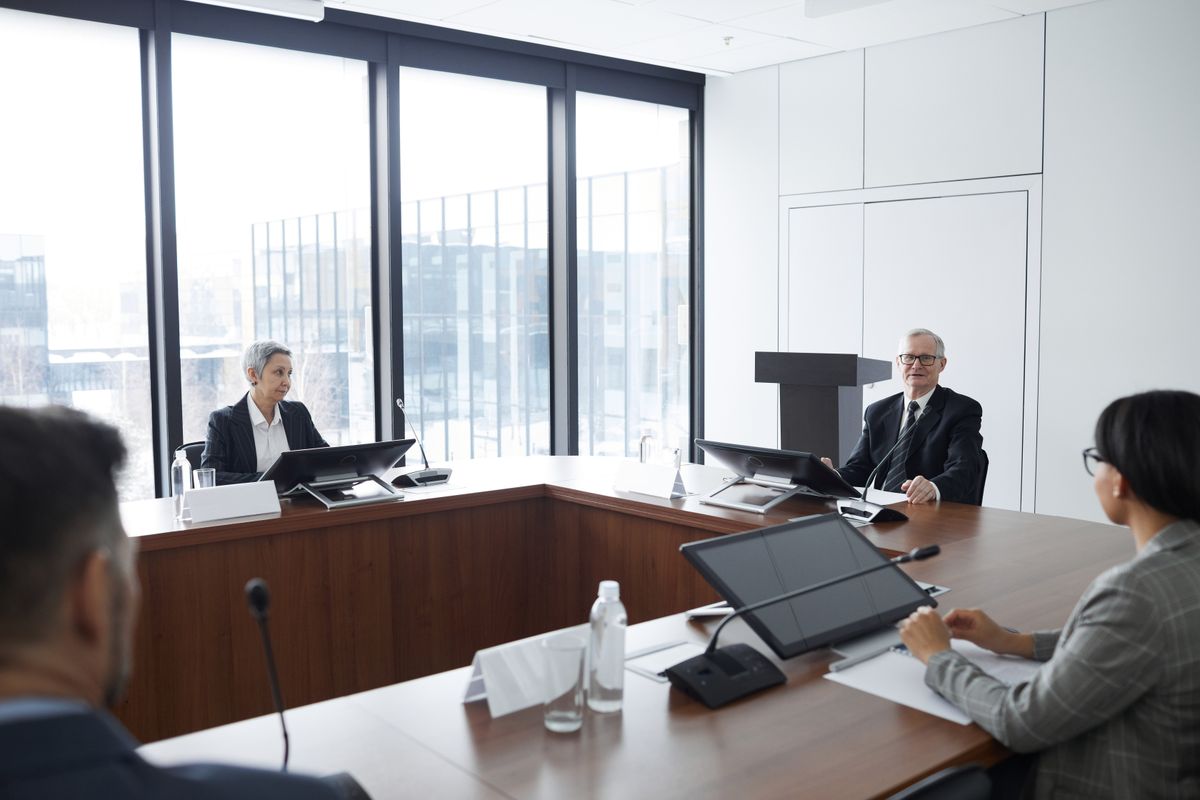Executives discussing an AI adoption strategy in a boardroom